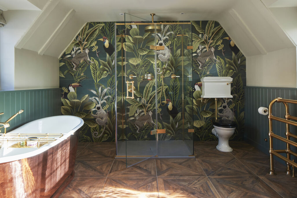 a bathroom with a shower and a tub