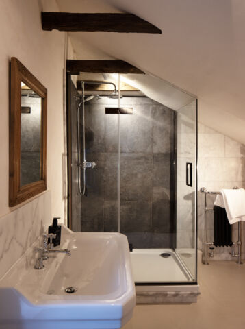 a bespoke black trimmed shower enclosure