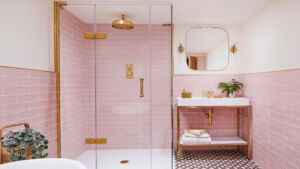 a bathroom with pink tiles and a glass Matki shower