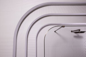 a curved shower screen in a bathroom