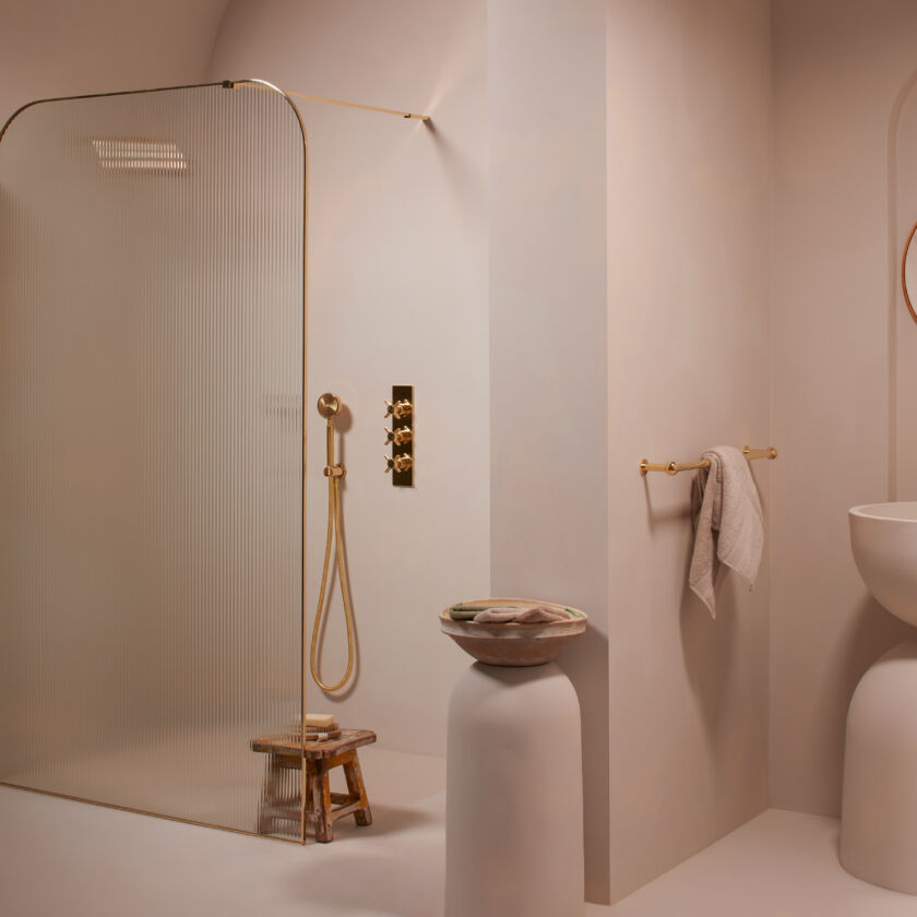 a bathroom with a Matki dome shower and sink