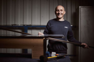 a man making a shower screen