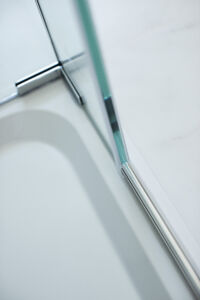 a close-up of a shower door