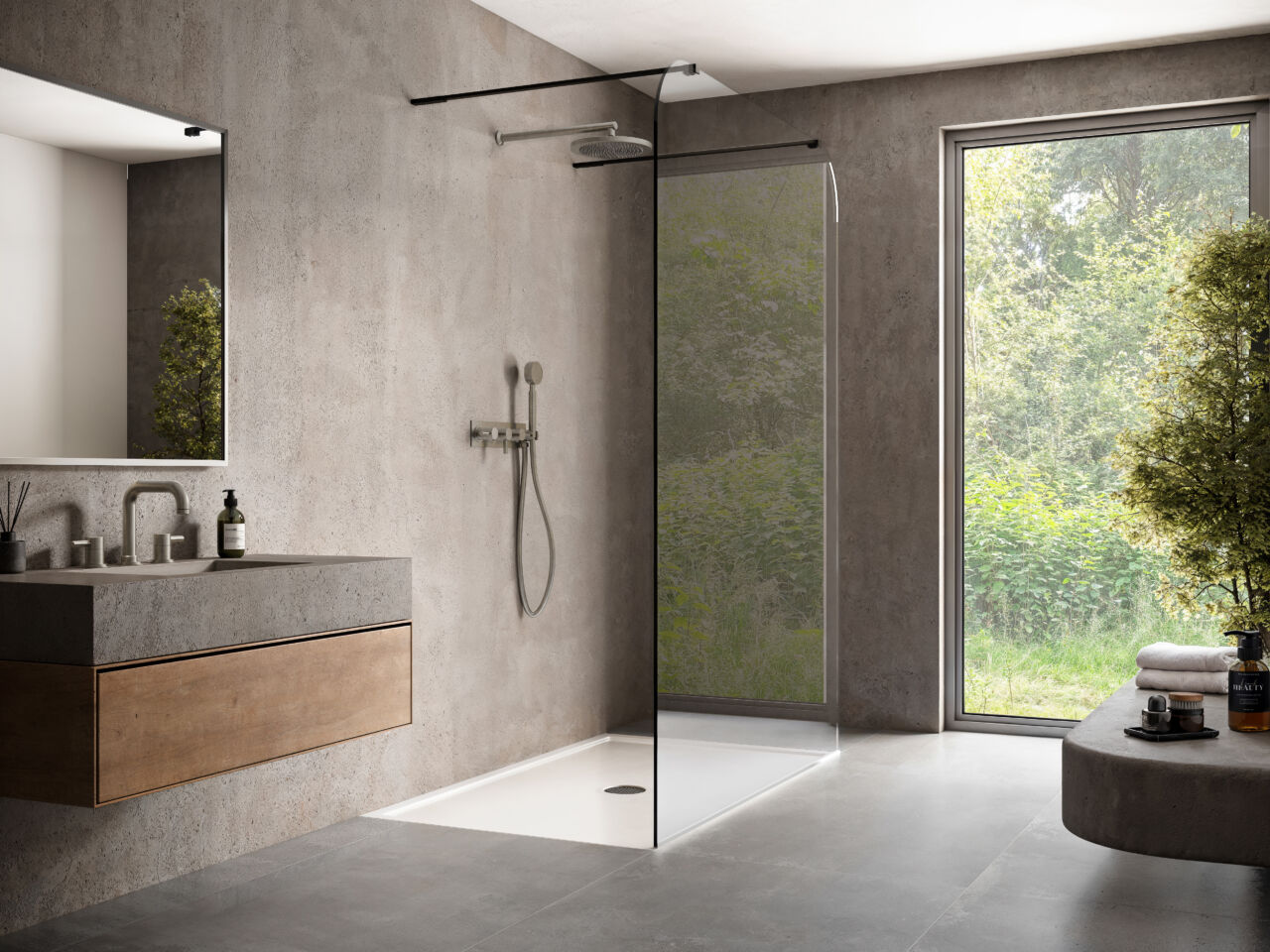 a wet room with a glass shower screen